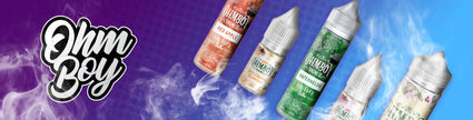 Ohm Boy e-liquid bottles with colorful labels and smoke backdrop, featuring flavors like tropical and mint on blue-purple gradient background.