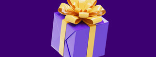 Purple gift box with a shiny yellow ribbon and bow on a purple background, symbolizing celebration and surprise gifts.
