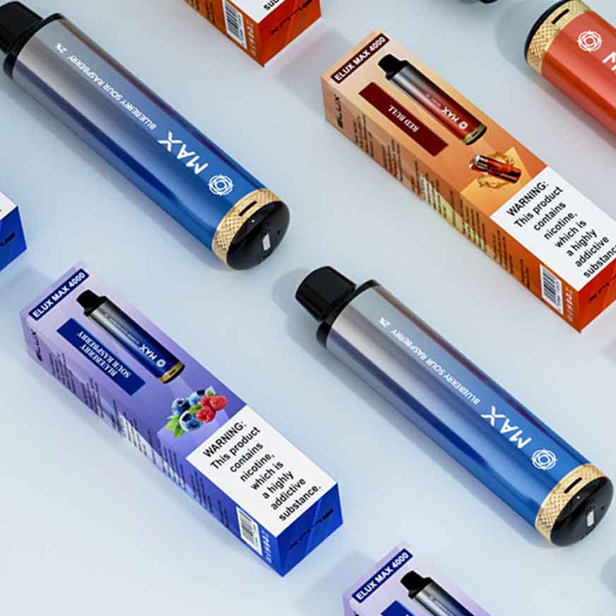 Colorful disposable vape pens and packaging with various flavor labels, displayed neatly on a white surface.
