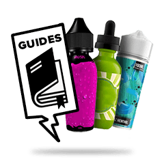 Colorful e-liquid bottles with a guides sign for vaping enthusiasts.