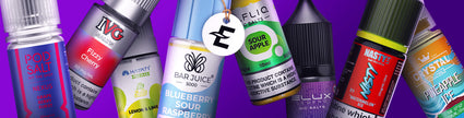 Assorted e-liquid bottles in various flavors against a purple background, showcasing diverse vaping options.