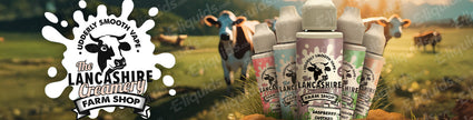 Lancashire Creamery vape juice bottles with cow logo in scenic farm background