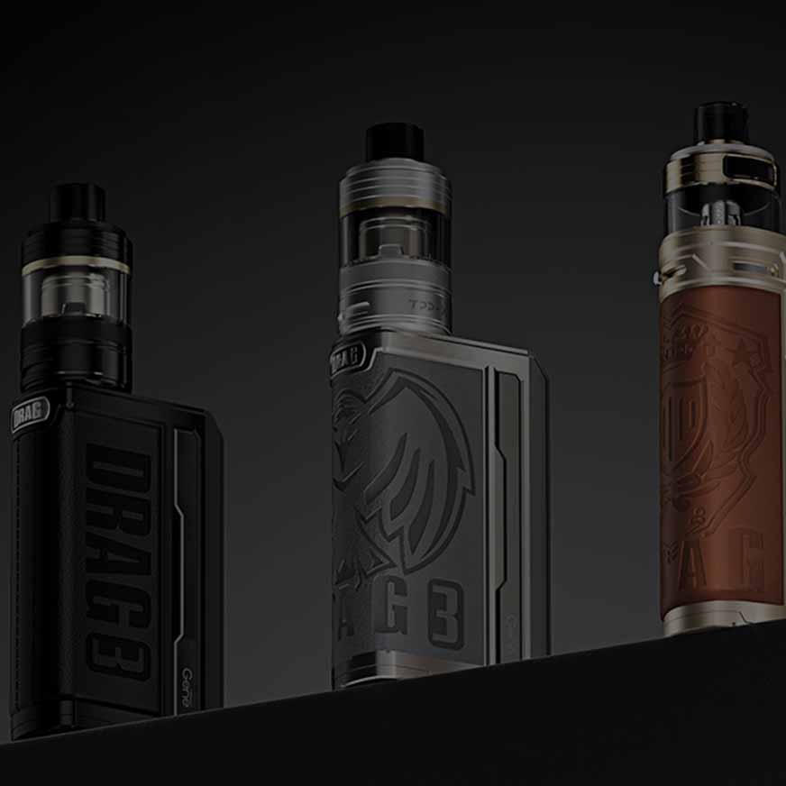 Three vaping devices with textured designs and sleek finishes displayed against a dark background.