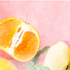 Sliced orange and apples on a pink background with mint leaves, highlighting fresh fruits and vibrant colors.