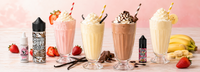 Milkshake e-liquid bottles arranged with strawberry, vanilla, chocolate and banana milkshakes in tall glasses.